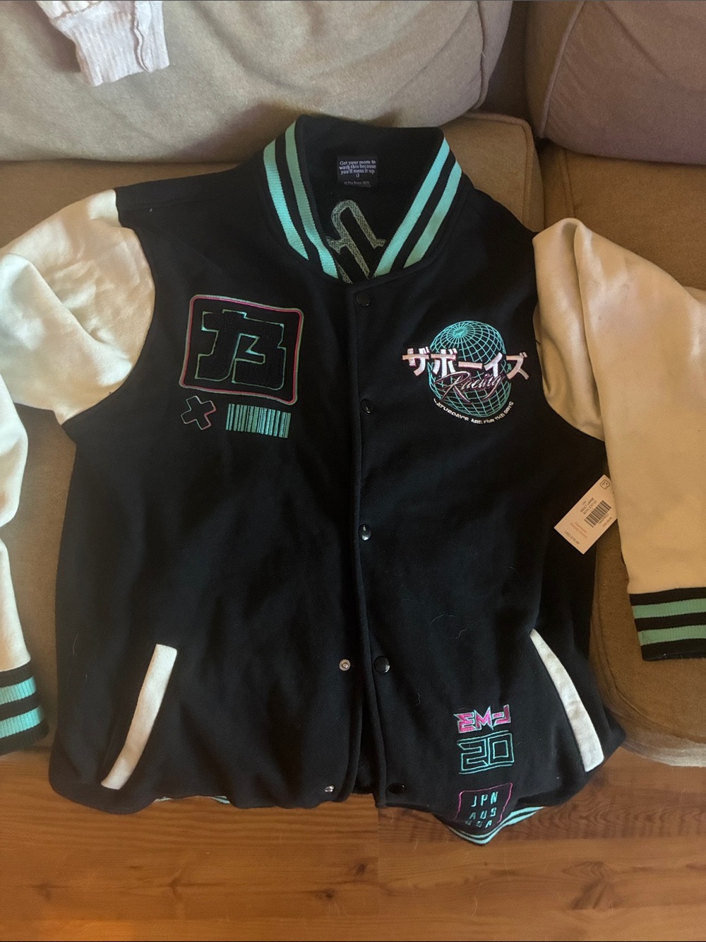 The Hundreds Black and Cream Bomber Jacket with Mint Trim